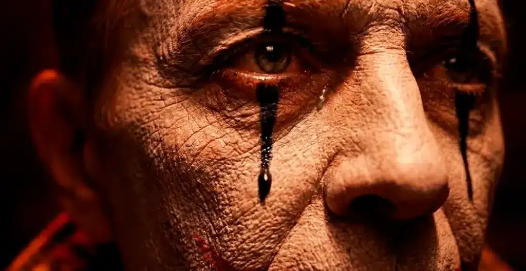 Still Here storyboard – the makeup tear Still Here AI short film: close-up of the aged clown as a black makeup tear runs down his face